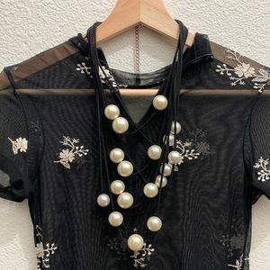 Large faux pearl leather cord necklace